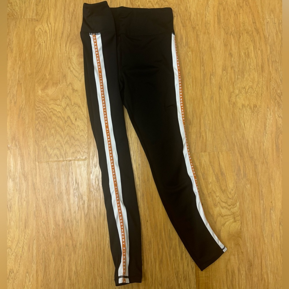 Orange Theory Fitness Black and Orange Striped Leggings